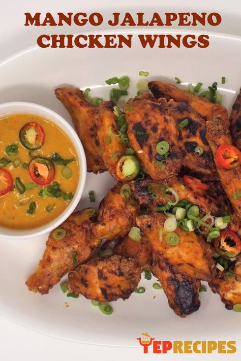 Crispy chicken wings in a sweet and spicy sauce made of jalapeno, mango, and ginger. #yeprecipes #recipe #wings #appetizer #spicy #chicken Mango Jalapeno Sauce, Mango Wings Sauce Recipes, Mango Jalapeno Chicken, Best Wing Sauce, Jalapeno Chicken Recipes, Cornbread Cake, Wing Sauce Recipes, Chicken Wing Sauces, Cilantro Chicken