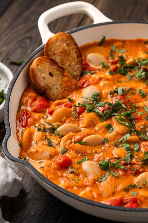 These Creamy Tomato Butter Beans are simple to make and will be on your table in 30 minutes. It's a cozy, delicious dish, full of rustic flavor. Serve it as an appetizer, side, or main meal with a loaf of crusty bread. Butter Bean Soup, White Bean Kale Soup, Butter Beans Recipe, Tomato Butter, Kale Soup, White Bean Soup, Butter Beans, Hearty Soups, Crusty Bread