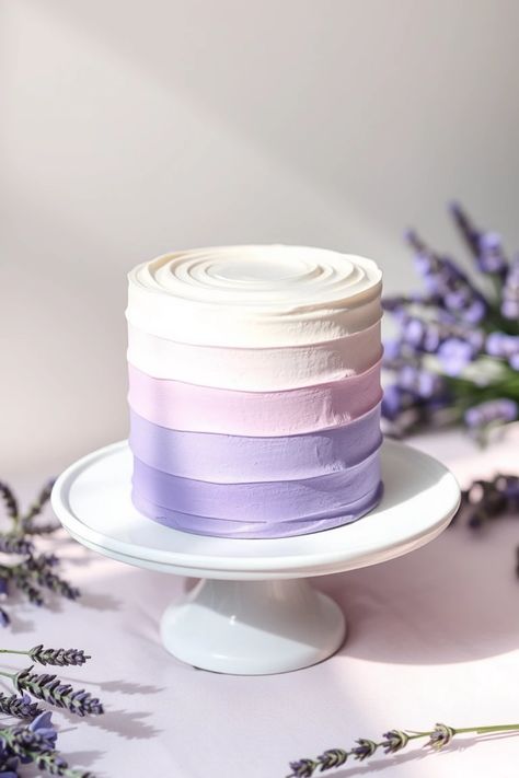 Looking to wow your guests with stunning desserts? Check out these 24 ombre cake ideas that combine creativity and taste in the most delightful way! From lavender dream ombres to bold and vibrant color blends, each cake is an eye-catching masterpiece that will steal the show at any event. Not only do they look amazing, but they're also surprisingly simple to decorate. Perfect for birthdays, anniversaries, or just because, these cakes will elevate your baking game. Get inspired and take your cake-making skills to the next level! Lavender Smash Cake, Birthday Cake Men Ideas, Lavender Theme Cake, Purple Silver Cake, Ombre Purple Cake, Ombre Cake Ideas, Ombre Cake Frosting, Lavender Colour Cake, Pretty Cake Ideas