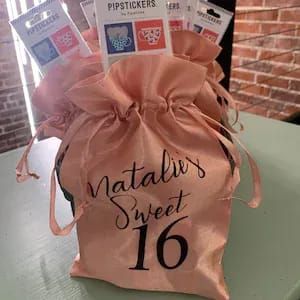 Need sweet 16 ideas? Easily elevate the decor at your 16th birthday party with these personalized Sweet 16 Favor Bags! You'll be busy on the day of the party, so these bags will make your life easy - simply pop candy or favors inside and cinch it shut with the ribbon. Check out all of our Sweet 16 Items at https://etsy.me/2ybyFpa. #sweet16 #16thbirthdayparty #sweet16favors Sweet 16 Ideas, Sweet Sixteen Party Favors, Birthday Party Favor Bags, Sweet 16 Party Favors, Sweet Sixteen Party, Birthday Party Items, Sweet 16 Favors, Sweet 16 Party, Sweet 16 Gifts