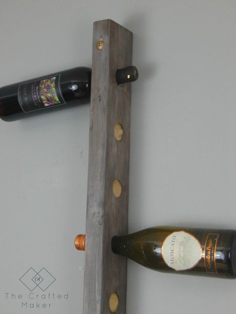 Build this DIY hanging wine rack out of one 2X4 board. For less than a bottle of wine, you can display your wine selection in style. Diy Wall Wine Rack Ideas, Diy Wine Wall Rack, Diy Wine Rack Projects, Wine Rack Projects, Bar Nook, Wine Rack Plans, Hanging Plants Diy, Hanging Wine Rack, Wine Rack Storage