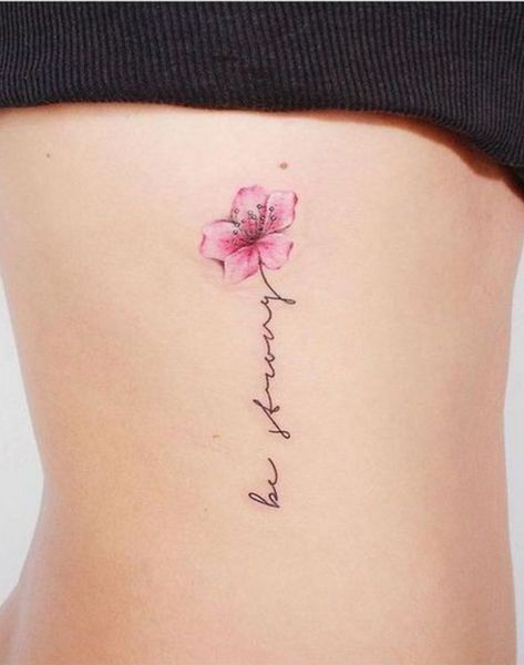 Be happy script tattoo | www.otziapp.com Watercolor Script Tattoo, Script Tattoo With Flowers, Flower With Script Tattoo, Be Happy Tattoo Ideas, Flower Script Tattoo, Be Happy Tattoo, Cherry Blossom Tattoo Shoulder, Bestie Tats, Rib Tattoo Quotes