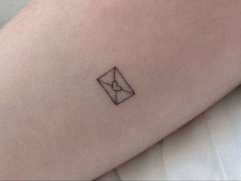 Small Coquette Tattoos, Fine Line Cute Tattoo, Short N Sweet Tattoo, Coquette Tattoo Aesthetic, Croquette Tattoo, Coquette Tattoo Ideas, Maja Core, Coquette Tattoo, Envelope Tattoo