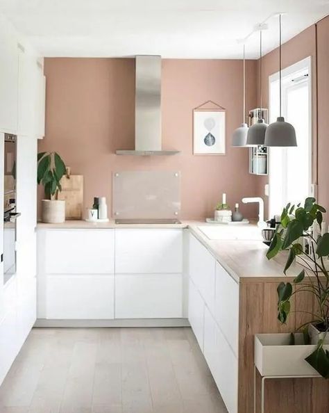 a serene kitchen with mauve walls, white minimalist cabinetry, wooden countertops, pendant lamps Narrow Kitchen Design, Narrow Kitchen, All Of, Cheap Home Decor, Home Decor Kitchen, Living Room Interior, Interior Design Kitchen, 인테리어 디자인, A Kitchen