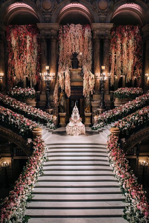 We are beyond thrilled to share the magic of this grand venue, where opulence meets elegance at every turn. From the majestic staircase adorned with breathtaking florals to the stunning cake that mirrored the ballroom perfectly, every detail was crafted to WOW! This iconic setting is perfect for a dream wedding or luxurious celebration. luxury event design, Paris wedding venue, majestic staircase, elegant floral decor, wedding cake inspiration, opulent wedding ideas. Extravagant Wedding Ideas, Dramatic Wedding Entrance, Fairytale Castle Wedding, Royal Inspired Wedding, Vintage Wedding Venue Aesthetic, Wedding Venues Inside, Magical Wedding Theme Fairytale, Royal Fairytale Wedding, Regal Wedding Theme