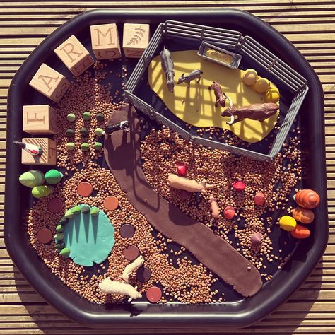 🚜🌾 We had our first go with the tuff tray today, a quick and simple farm setup! My middle cub is all about tractors and farms at the moment, so we went with it—mud tracks, animal feeding, and a whole lot of farmyard fun! 🐷🐮 With the youngest cub teething, I didn’t have much time to set it up, but it was a hit nonetheless. We used brown playdough for the mud/dirt track, yellow for the animal enclosure, and blue for the pond, along with some of our favourite farm animals. Needless to say, my l... Brown Playdough, Plant Sunflowers, Tuff Tray Ideas, Sensory Dough, Farm Fun, Tuff Tray, Woodland Friends, Small World Play, Dairy Cows