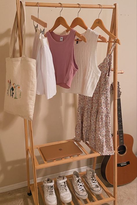 Clothing Hanger Rack Aesthetic, Clothes Hanger Bedroom, Urban Outfitters Clothing Rack, Cloth Hanger Stand Aesthetic, Clothing Rack Inspo Aesthetic, Aesthetic Hanger Clothes, Aesthetic Clothing Storage, Clothing Hanger Aesthetic, Closet Rack Aesthetic