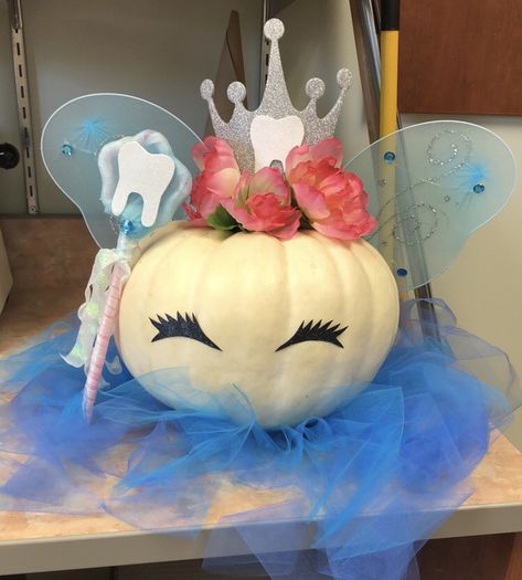 Tooth fairy pumpkin Tooth Pumpkin Decorating, Pumpkin Decorating Contest Dentist, Tooth Pumpkin Carving Ideas, Dental Office Pumpkin Ideas, Dental Pumpkin Painting Ideas, Dental Pumpkin Carving Ideas, Angel Pumpkin Decorating, Pumpkin Painting Ideas Dental, Dental Themed Pumpkins