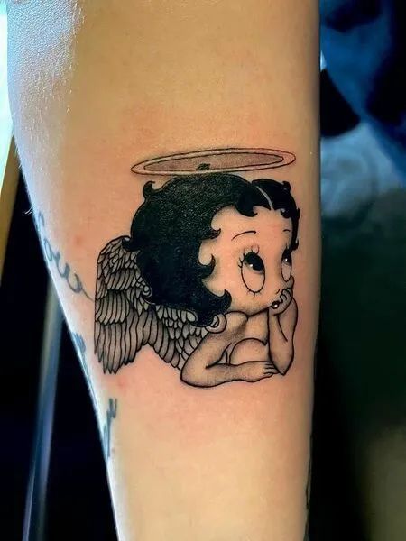 #follow #tattooideas #tattoos #blogging #blogger #blog Black And White Betty Boop Tattoo, Betty Boop Memorial Tattoo, Betty Boop Angel Tattoo, Black Betty Boop Tattoo, Betty Boop Tattoo Vintage, Angel Betty Boop, Betty Boop Tattoo Ideas, Betty Pop, Practice Tattoos