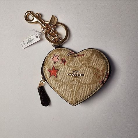 Coach Heart Pouch Bag Charm In Signature Canvas With Heart And Star Print Gold/Light Khaki Multi Msrp: $98 Signature Coated Canvas And Smooth Leather Zip Closure, Fabric Lining Attached Split Key Ring And Dogleash Clip 3 1/2" (L) X 3" (H) X 5" (W) Style No. Ck071 Disney 50th Anniversary, Vintage Crossbody Bag, Over The Shoulder Bags, Signature Canvas, Coach Crossbody Bag, Black Leather Bags, Gold Light, Coach Leather, Pouch Bag