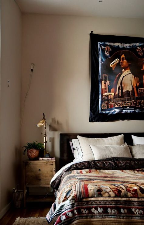 Create an indie rock aesthetic bedroom by incorporating a tapestry with a band logo or album artwork as a focal point. Pair it with vintage concert posters and string lights for a cool and edgy vibe. Rock Aesthetic Bedroom, Indie Rock Aesthetic, Rock Aesthetic, Vintage Concert Posters, Album Artwork, Band Logo, Band Logos, Indie Rock, Aesthetic Bedroom