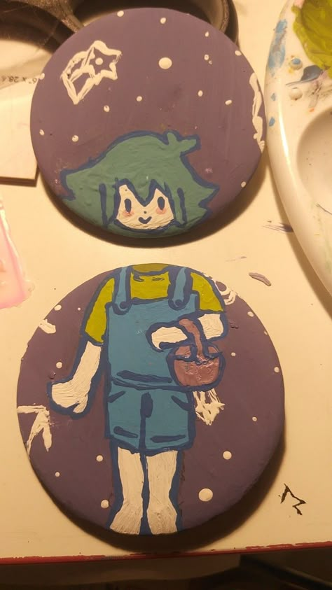 There are two pins with a space background, the top one depicting the head of a character from omori named basil with short ,teal hair and the bottom pin showing his body, wearing a yellowish green t-shirt and blue overalls. He is holding a purple-ish basket with nothing inside. Basil Omori, Uh Oh, I Have No Friends, Mole, What Happened, Preschool Activities, Basil, Atlanta, Stairs