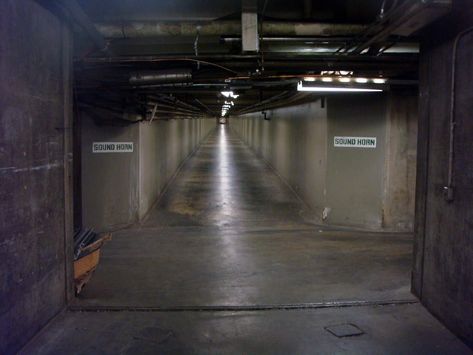 There's a network of former Prohibition booze-running tunnels under the streets of LA behind the Hall of Records (222 N Hill St.) Off the sidewalk, take an unmarked elevator to the bottom floor & you can explore some of the pedestrian tunnels that stretched under much of DTLA. These tunnels were used to shuttle booze, and one of them still runs right to the basement of Skid Row bar King Eddy Saloon. Much of the network has been declared an earthquake hazard and closed to the public. Levels Of Hell, Puppet Combo, Hidden Tunnel, Doomsday Bunker, Underground Bunkers, California Attractions, Los Angeles Aesthetic, Stanley Parable, Secret Tunnel