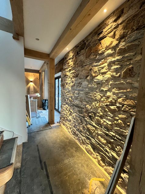 Barn Conversion: In keeping with the traditional barn aesthetic, we installed plaster-in downlights throughout the property, designed to blend seamlessly with the ceiling. These downlights keep the focus on the room's natural elements, while still providing clean and modern illumination. Another unique feature is the use of micro spotlights to highlight the stone walls, adding depth and character to the space. The small lights discreetly highlight the texture of the stone, offering an elegan... Barn Aesthetic, Small Lights, Stone Walls, Barn Conversion, Natural Elements, Small Light, Wine Cellar, Stone Wall, The Space