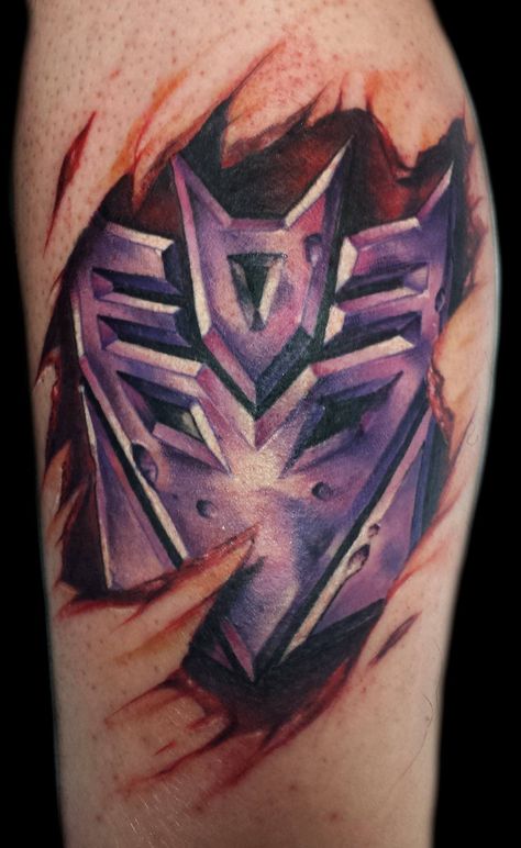 Color, Decepticon Logo Tattoo Transformers Tattoos, Megatron Tattoo, Decepticon Tattoo, Transformers Tattoo Ideas Optimus Prime, Transformers Tattoo Ideas, Transformers Symbols Tattoo, Transformers Tattoo, Decepticons Tattoo, Decepticon Logo Tattoo