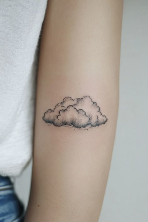 A detailed cloud tattoo on a person's forearm. Shaded Cloud Tattoo, Minimalist Cloud Tattoo, Small Cloud Tattoo, Dreamy Tattoo Ideas, Heavenly Tattoo, Cloud Tattoo Ideas, Cloud Tattoos, Cloud Tattoo Design, Sky Tattoo