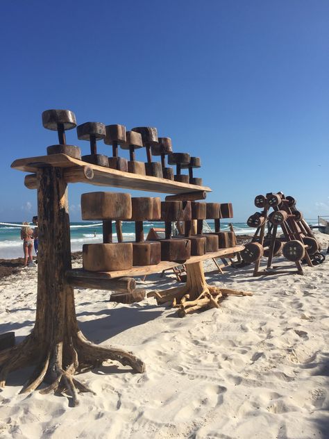 Tulum Jungle Gym Flintstone style gym on the beach | Mexico Tulum Jungle Gym, Tulum Jungle, Tulum Mexico Beach, Style Gym, African House, Diy Home Gym, Beach Gym, Beach Sunset Wallpaper, Jungle Gym