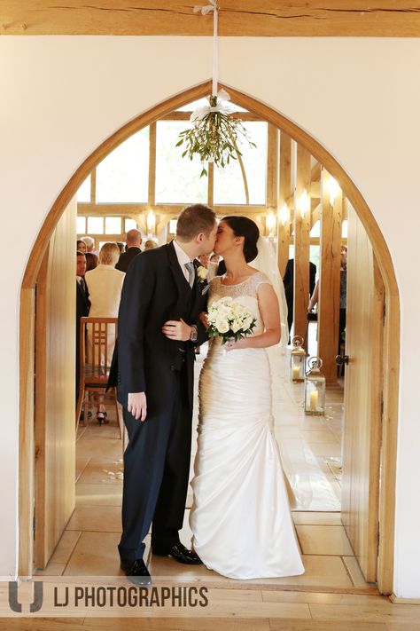 Kissing under the #mistletoe  A simple and beautiful idea for a #Christmas #wedding at #Rivervale Barn @LJPhotographics Mistletoe Wedding, Wedding Mistletoe, Mistletoe Wedding Arch, Mistletoe At Wedding, Christmas Couple Pictures Mistletoe, Kiss Under The Mistletoe, Kiss Under Mistletoe, Couples Kissing Under The Mistletoe, Festive Wedding