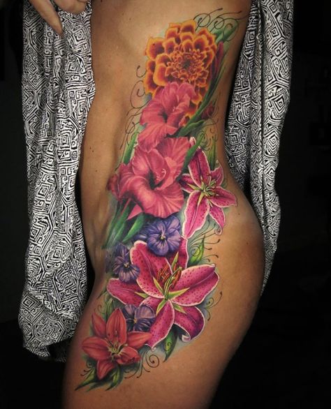 Leg Tattoos Colorful, Full Buttocks Tattoo Women, Back Color Tattoo Women, Colourful Flower Tattoos For Women, Colorful Flower Back Tattoo, Colorful Hip Tattoos Women, Women Color Tattoos, Cardi B Leg Tattoo, Womens Color Tattoos