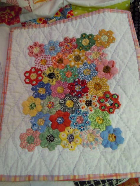 This is a blog for the busy woman who quilts, sews, cooks, decorates, and loves to craft! Grandmothers Garden Epp, Grandma's Garden Quilt Pattern, Hexagon Flower Quilt Patterns, Grandma’s Flower Garden Quilt Pattern, Grandmothers Flower Garden Quilt Pattern Free, Grandmas Flower Garden Quilts, Hexie Quilts Patterns Layout, Grandmothers Flower Garden Quilt Pattern, Hex Quilt