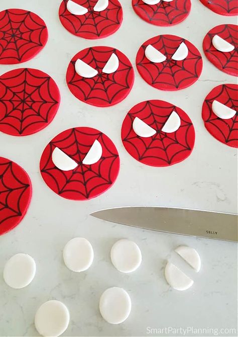 Adding eyes to spiderman cake toppers Spiderman Cupcake Toppers, Spiderman Cookies, Spiderman Cupcakes, Fondant Roller, Spiderman Cake Topper, Superhero Cupcakes, Spiderman Theme, Spiderman Birthday Party, Homemade Birthday Cakes