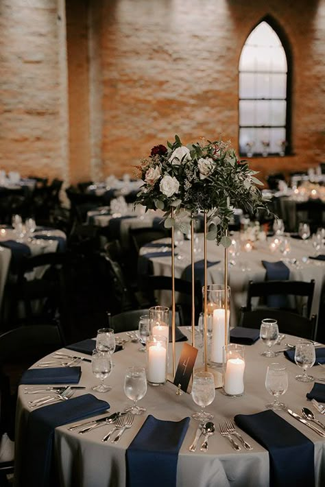 Laura + Andy Classic Blue Wedding Table Decor, Wedding Decor Ideas Table Setting, Navy Blue And Grey Wedding Centerpieces, Dusty Blue And Navy Table Setting, Ivory And Navy Wedding, Contemporary Wedding Centerpieces, Dark Blue Wedding Reception, Navy Blue Centerpieces Wedding Round Table, Wedding Centerpieces Classic