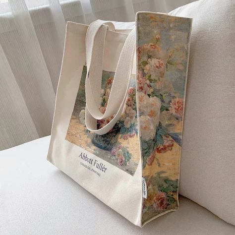 A tote bag depicting "Still Life of Flowers" by Abbott Fuller Graves. Pink and white roses are overflowing from the vase, creating a romantic atmosphere. It is made of thick canvas material and has plenty of storage capacity. Comes with a pocket inside. Pack your computer and your favorite books and head out.       Size     Height: 36cm   Width: 36cm   gusset: 10cm       Material     Thick canvas fabric Elegant Tote Bag, Cute Tote Bag Ideas, Tote Bag Ideas Design, Gift Bag Design, Tote Bag Design Ideas, Creative Tote Bag, Flower Bags, Pink And White Roses, Flowers Tote