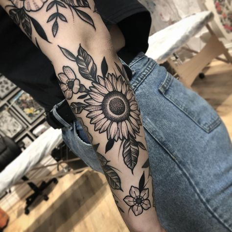 Luke Schubert on Instagram: “More flowers from Friday. What started as a cover up on her inner bicep and in her words “her last tattoo ever” I ended up seeing Chloe two…” Sunflower Tattoo Traditional Black, Word Cover Up Tattoo, Traditional Sun Tattoo, Secret Tattoo, Timeless Tattoo, Traditional Tattoo Art, Tattoo Black, Hair Tattoos, Tattoo Cover-up