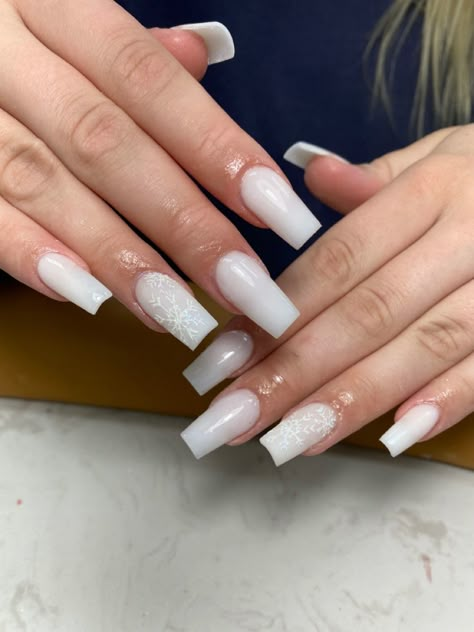 medium length coffin white nails with snowflakes on the ring fingers Hailey Bieber Nails With Rhinestones, Basic White Christmas Nails, Milky White Nails With Snowflakes, Nails Winter Christmas, Acrylic Nail Designs For Winter, White Snowflake Nails Acrylic, Wintry Nails, Simple Winter Nails Square, Nails With Snowflakes