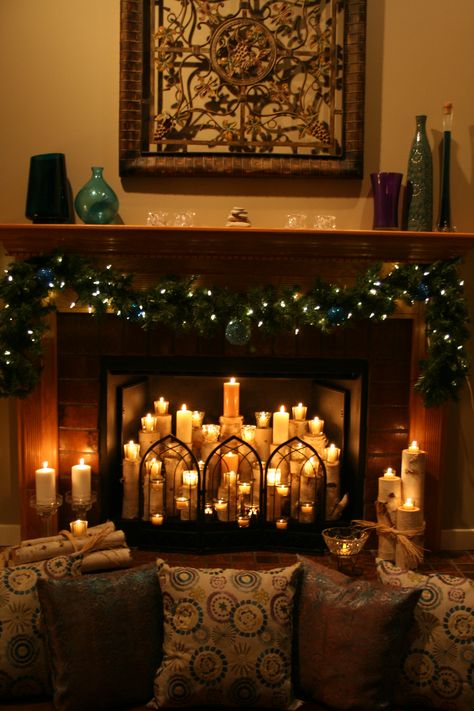 DIY Candle Fireplace Diy Candle Fireplace, Candle Fireplace, Unused Fireplace, Faux Fireplace Mantels, Halloween Fireplace, Halloween Living Room, Fake Fireplace, Candles In Fireplace, Faux Fireplace