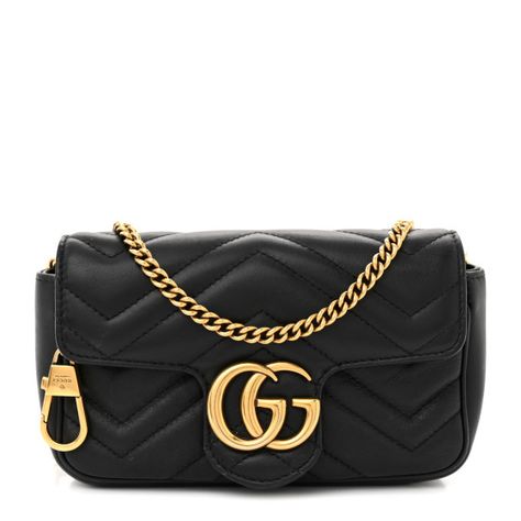 This is an authentic GUCCI Calfskin Matelasse Super Mini GG Marmont Shoulder Bag in Black.This shoulder bagis crafted of smooth calfskin leather in black with chevron quilting and a quilted heart at the back. This bag features a removable aged gold chain strap and an aged gold GG logo on the front. The flap opens to a beige microfiber interior with a removable key ring. Chevron Quilt, Gg Logo, Gg Marmont, Shoulder Bag Black, Chain Strap, Key Ring, Gold Chain, Gold Chains, Calf Skin