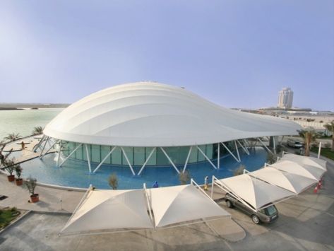 Installaion Year: 2006; Area: 3,000 sq.mt; Membrane Material: Ferrari 1202S Location: UDC Sales and Marketing Offfice in the Pearl, Doha, Qatar Standard: Design, Materials, Production, Installation and Quality Controll all basic on European Standards Description: This steel Dome Shell Shaped Membrane Roofing Structure project was done by our Canobbio Italy Team in 2006. Shell Architecture Concept, Shell Structure Architecture, Shell Building, Tiny Houseboat, Tensile Membrane, Italy Team, Construction Technology, Shell Structure, Membrane Structure