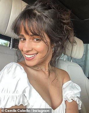 Camila Cabello heads to lunch in Hollywood in tblack crop top with nude hoodie and drawstring pants | Daily Mail Online Long Shag Haircut, Cabello Hair, 70s Hair, Half Ponytail, Wispy Bangs, Shag Haircut, Long Hair With Bangs, Hair A, Mode Inspiration