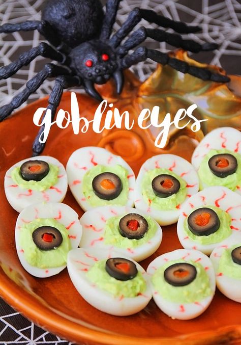 Goblin Eyes are a festive food for a Halloween party that taste great too! Wonton Bats, Eyeball Deviled Eggs, Halloween Dinner Recipes, Halloween Deviled Eggs, Halloween Appetizer, Scary Food, Halloween Food Dinner, Halloween Party Appetizers, Perfect Halloween Party