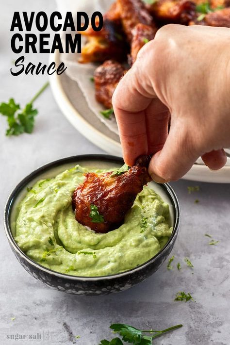 This Avocado Cream Sauce is tangy, nutty and perfect for using as a dip or for topping burgers or tacos. It's almost a smooth, creamy guacamole minus tomato and every bit as delicious. #sugarsaltmagic #avocadodip #avocadosauce #creamyguacamole Dip Sauces, Guacamole Sauce, Avocado Dipping Sauce, Avocado Cream Sauce, Keto Dips, Creamy Guacamole, Cream Sauces, Healty Dinner, Wagon Wheels