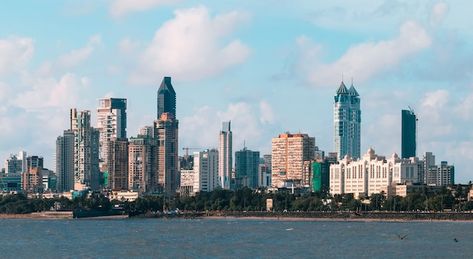 Free photo mumbai skyline seen from mari... | Free Photo #Freepik #freephoto #mumbai-skyline #mumbai-city #mumbai #indian-city Mumbai Skyline, South Mumbai, Investment In India, Marine Drive, Immigration Consultant, Canada Immigration, Vacation Deals, Unique Buildings, Four Seasons Hotel