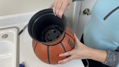 If you have an old basketball at home that no one is using anymore, why not turn it into a pretty plant pot? This DIY Basketball planter is so easy to make, and it took me less than hour to do. If you don't have an old basketball at home, try looking for one in thrift stores. Or, I've seen basketballs at Dollar Tree Plus stores for $5. SuppliesBasketballUtility knife (optional)ScissorsMarkerYarn or other type of cordSpray paint (optional)DirectionsDecide which pot you are… Basketball Planter, Old Basketball, Diy Basketball, Pretty Plant, Circle Template, Air Plant Holder, A Basketball, Garden Stuff, Hanging Planter