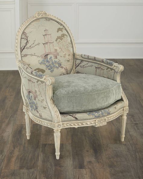 Featuring an elegantly carved frame and nailhead trim, this beautiful bergere chair is upholstered in a stunning scenic motif complemented by a solid seat cushion. Handcrafted of engineered hardwood and polyester Overall, approx. 29"W x 33"D x 40"T Seat, 25"W x 23"D x 19"T Arm height, 24" Finished back Spot clean Weight, 40.0 lbs Made in USA Boxed weight, approximately 45.0 lbs Shipping Direct from Vendor, usually ships within 35 business days. French Chairs Upholstery, Antique Chair Styles, Event Mood Board, Rococo Chair, Provincial Decor, French Provincial Decor, French Manor, French Country Decorating Living Room, Furniture Makeover Inspiration