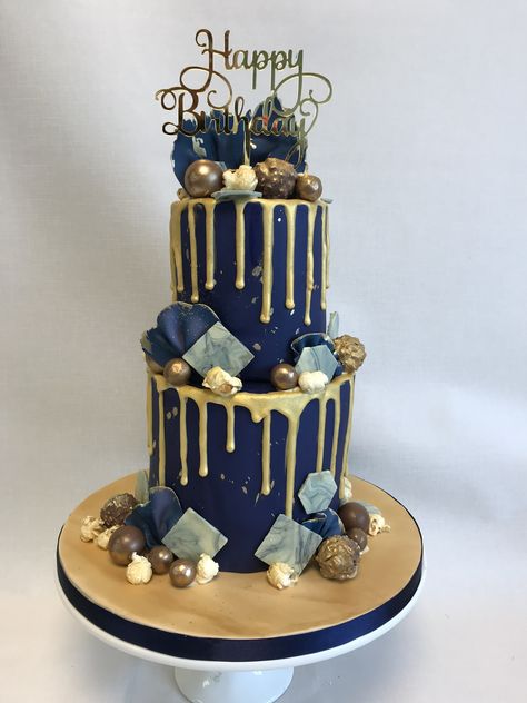 tall 2 tier Navy & gold theme birthday cake for a man Men’s Birthday Cake 2 Tier, Navy Blue Birthday Theme For Men, Tall Birthday Cake For Men, 18th Birthday Cake Blue And Gold, Two Tier Birthday Cake For Man, Navy And Gold Birthday Cake, Blue Gold Birthday Theme, 2 Tier Cake For Men, Gold Cake Decorating Ideas