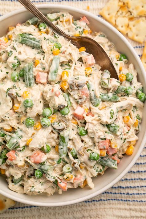 Mexican chicken salad is tender shredded chicken tossed in a creamy sauce with mixed veggies, fresh cilantro, and jalapeños… Tons of flavor! One of my favorites from my time in Texas and California, this is a great dish to serve at any potluck, cookout, or BBQ and will be gone in no time. Delicious on tostadas, with saltines for dipping, as a sandwich, or even eaten straight with a fork! Shredded Chicken Salad, Mexican Chicken Salad, Cold Chicken Salads, Lemon Pepper Chicken Breast, Shredded Chicken Salads, Mexican Chicken Salads, 40 Aprons, Keto Chicken Salad, Chicken Tostadas