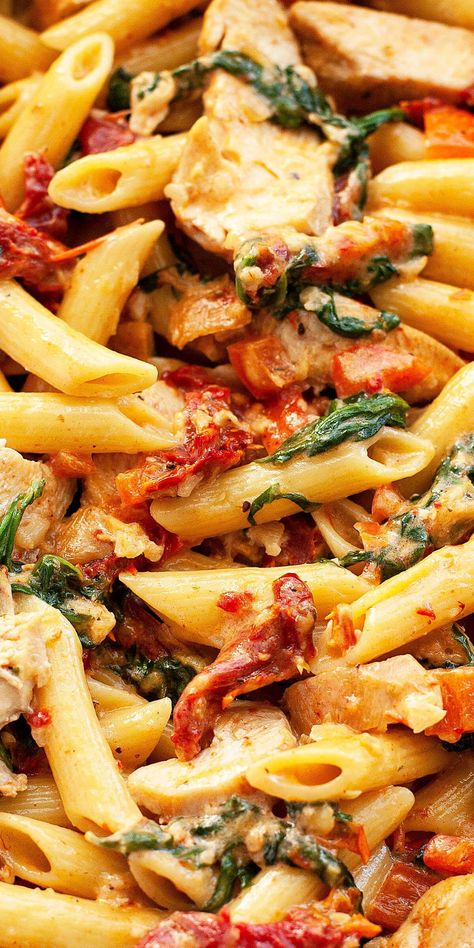 Creamy Tuscan Chicken Pasta is loaded with the flavors of the Mediterranean – sundried tomato, baby spinach, garlic, red pepper, and parmesan. It’s super quick and easy. A restaurant quality dish on the table in under 30 minutes. #pasta #recipe #recipeeasyfast #chicken #chickenrecipes #chickendinner #chickendishes #easy #easyrecipe #easydinner Pasta Mexicana, Creamy Tuscan Chicken Pasta, Pork Pasta, Creamy Tuscan Chicken, Sundried Tomato Pasta, Pasta With Chicken, Tuscan Chicken Pasta, Bacon Pasta, Tuscan Chicken