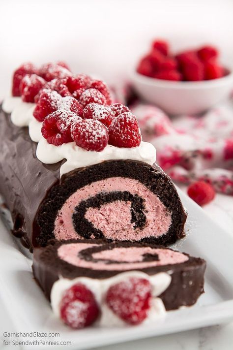 An easy to make chocolate swiss roll with a raspberry filling. This the perfect Valentine's day dessert or for any time you need a beautiful sweet treat. Chocolate Swiss Roll, Valentines Recipes Desserts, Raspberry Desserts, Swiss Roll Cake, Cake Roll Recipes, Raspberry Chocolate, Chocolate Roll, Torte Cupcake, Valentine Desserts