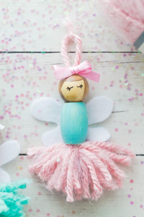 These Pom Pom Ballerina Fairies are the sweetest project for any little girl! They make great little bookshelf decorations or ornaments. Diy Ballerina Ornaments, Little Bookshelf, Fairy Ballerina, Ballerina Ornaments, Pom Crafts, Ornaments Homemade, Christmas Child, Operation Christmas, Ballerina Doll