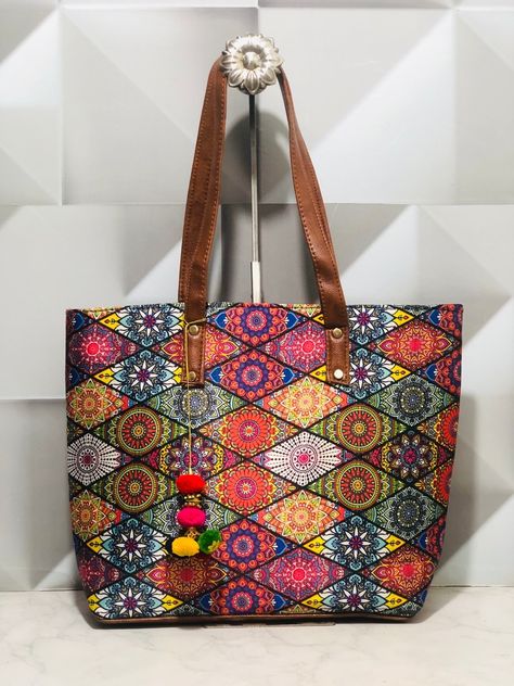 IKAT TOTE BAGS The IKAT Bag has 2 zipper compartment, Rate:290+S Dimension:16x13 Avaialable at unbeatable prices. R03 Luxury Multicolor Hobo Tote Bag, Multicolor Artisan Tote Bag, Eco-friendly Multicolor Square Bag, Large Eco-friendly Multicolor Bags, Ikat Bag, Tote Bags, Zipper, Tote Bag