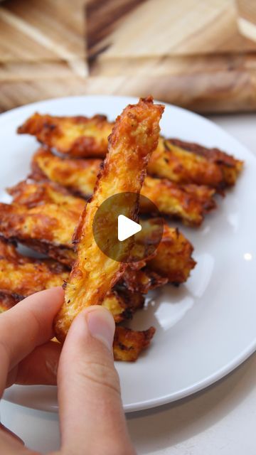 31K views · 2.1K likes | iRick Wiggins on Instagram: "Say “YUM” if you would eat these Cauli Fries 🤤   Ingredients: 1 cup cauliflower rice, cooked & squeezed until ALL of the moisture is gone  1/2 cup shredded cheddar cheese 1 egg Salt & pepper  Instructions: 1. Preheat oven to 400°F. 2. Mix your cauliflower rice, cheddar, egg & seasonings.  3. Scoop on to a parchment lined baking sheet & shape into fries.  4. Bake for 20-25 minutes (until golden brown and crispy).  5. Serve with sugar free ketchup & enjoy!" Irick Wiggins Recipes, Cauliflower Fries, Fries Cauliflower, Irick Wiggins, Keto Cheese Fries, Riced Cauliflower Recipes, Cauliflower Rice Cheese Bread, Keto Cauliflower Fried Rice Recipes, Keto Chicken Fried Rice Cauliflower