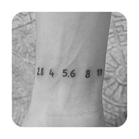 My f numbers tiny tattoo #aperture #ink #photography #camera #lens #fstop #wrist Best Photography Camera, Ink Photography, Camera Tattoos, Best Camera For Photography, Small Tats, Camera Tattoo, Indoor Wedding Ceremonies, Tiny Tattoo, Dad Tattoos