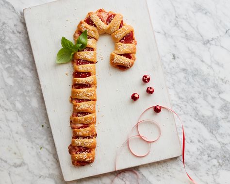 Recipe of the Day: Pizza Candy Cane Crescent | Look again: This savory candy cane-shaped appetizer is filled with all the fixings of a pepperoni pizza. A sweet basil bow is the perfect finishing touch. Crescent Recipes, Easy Holiday Recipes, Crescent Roll Recipes, Crescent Dough, Smitten Kitchen, Christmas Appetizers, Crescent Rolls, Rolls Recipe, The Ranch