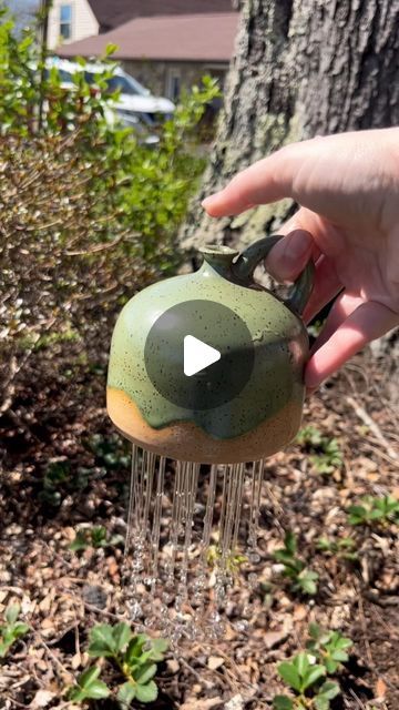 Cheri Downey | Ceramicist on Instagram: "🪴Plant Watering Bell: How-To🪴 

I didn’t have an indoor potted plant near me to show you how these work so I did it outside 😂 BUT I feel like this is still a great example!! When you cover the top hole with your thumb, it blocks airflow and therefore blocks water from falling out. So with these, you can move plant to plant for watering time and release your thumb over each plant! I love the flow and how it looks like a rain shower 💧 

Anyways, if you want one, I have sent them all over to @glasstangerine for purchase 🤍

#ceramics #pottery #potteryasmr #glaze #ceramicglaze #glazelayering #supportsmallbusiness #giftideas #homedecor #wateringbell #handmademug #madeinaskutt #fired #wheelthrown  #brownclay #speckledclay #cookeville #cookevilleplants Thumb Watering Can, Watering Bell, Ceramic Watering Can, Throwing Clay, Water Time, Pottery Projects, Hand Built Pottery, Club Ideas, Ceramics Pottery