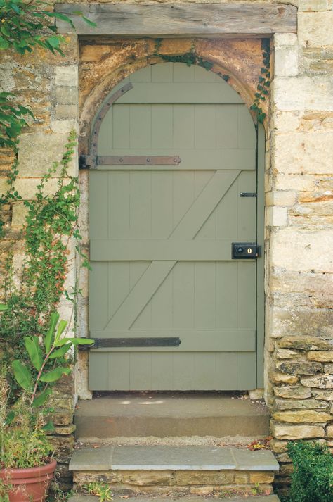 If you want to play up the hues of the surrounding landscape when painting your front door, our experts say to consider a sophisticated earth-toned green like Farrow & Ball's Lichen. #marthastewart #colorfuldecor #decorideas #diydecor Behr Painters White, Coral Front Doors, House Paints, Best Front Door Colors, Paint Gallery, Green Grey Paint, Exterior Shades, Best Front Doors, Green Front Doors