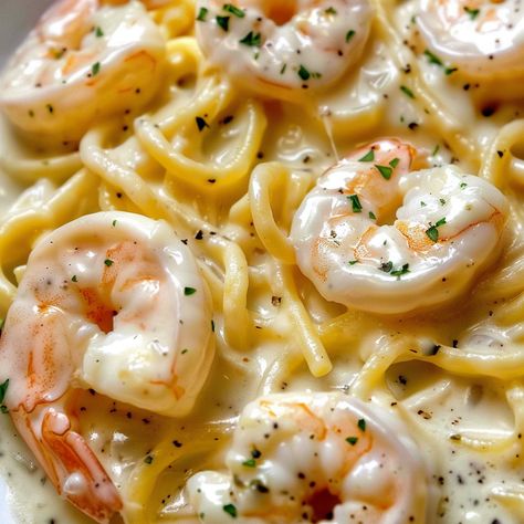 30 Minute Cheesy Garlic Shrimp Alfredo Cheesy Garlic Shrimp Alfredo, Garlic Shrimp Alfredo, Shrimp Alfredo Pasta Recipes, Cheesy Shrimp, Chick Fil A Sandwich, Lemon Pepper Shrimp, Shrimp Alfredo Recipe, Easy Shrimp Scampi, Seafood Medley